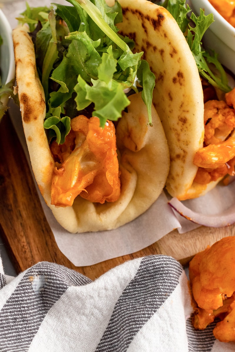 close up buffalo cauliflower wraps