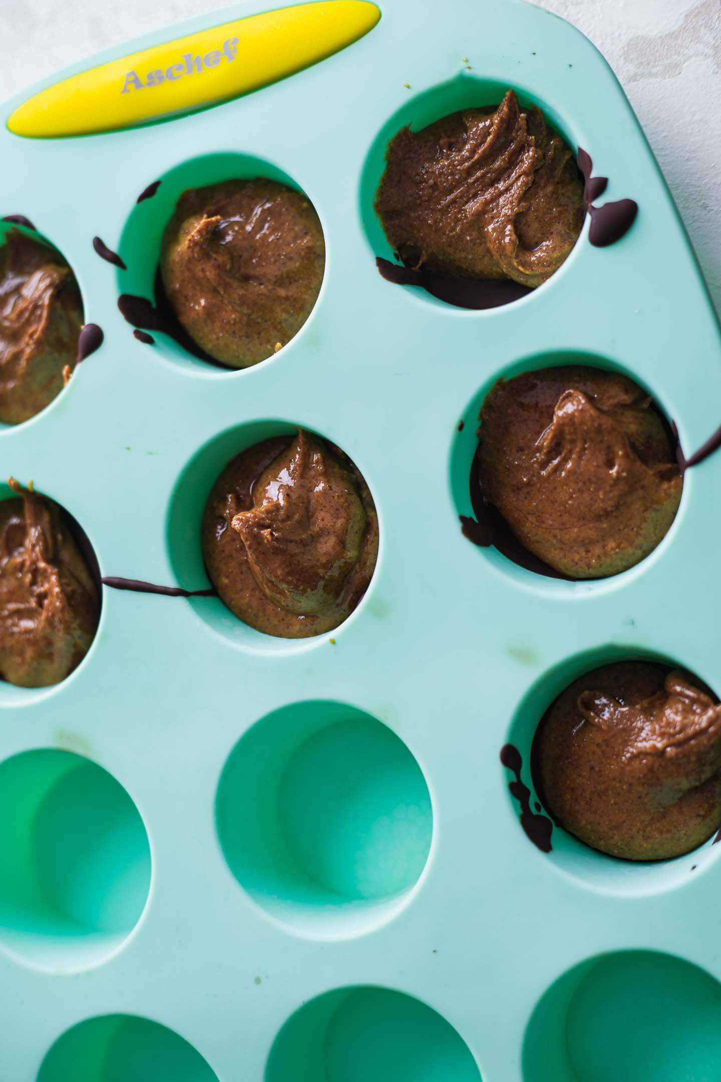 Dark chocolate in cupcake cases with a peanut butter filling