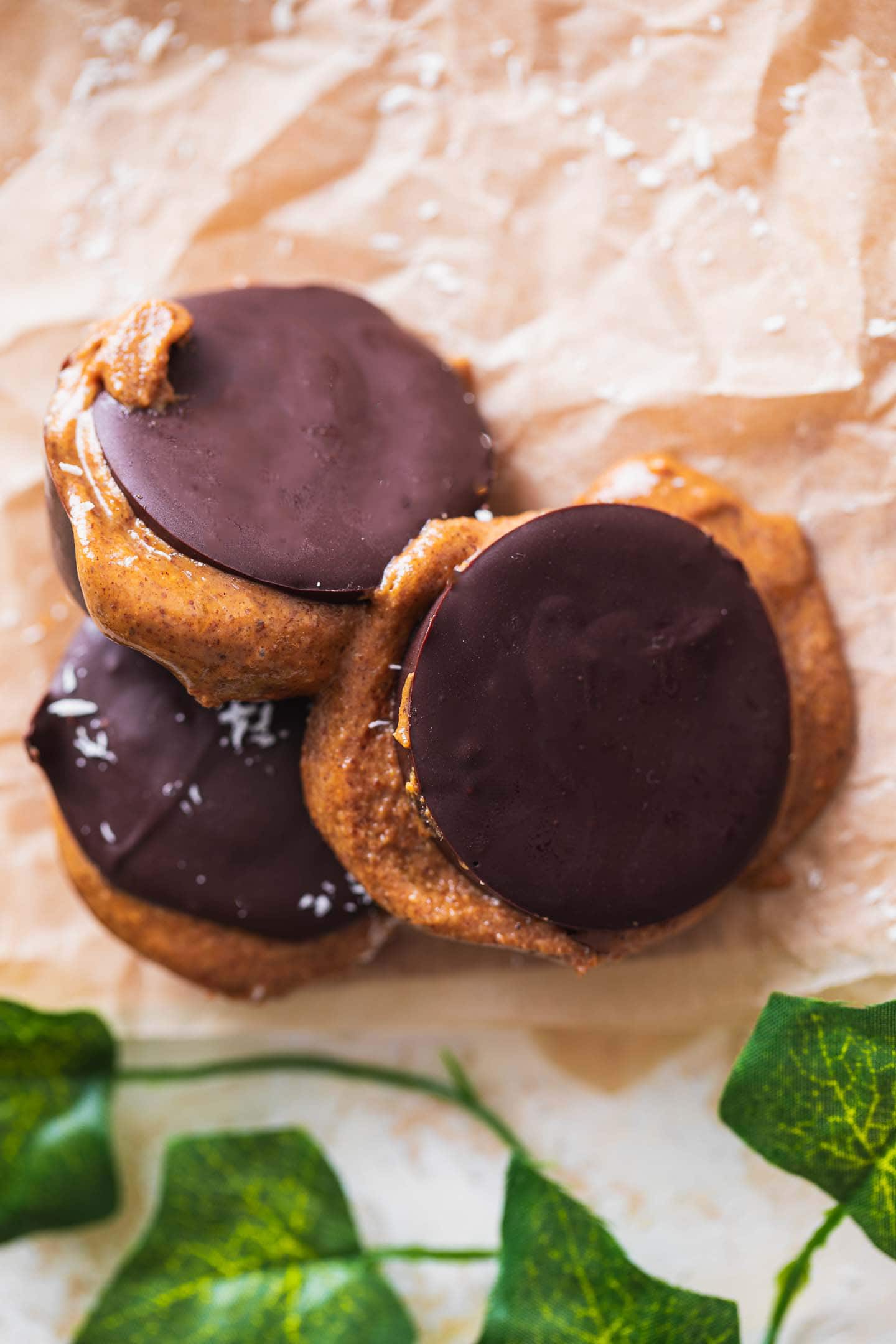 Homemade nut butter snacks on a sheet of parchment paper