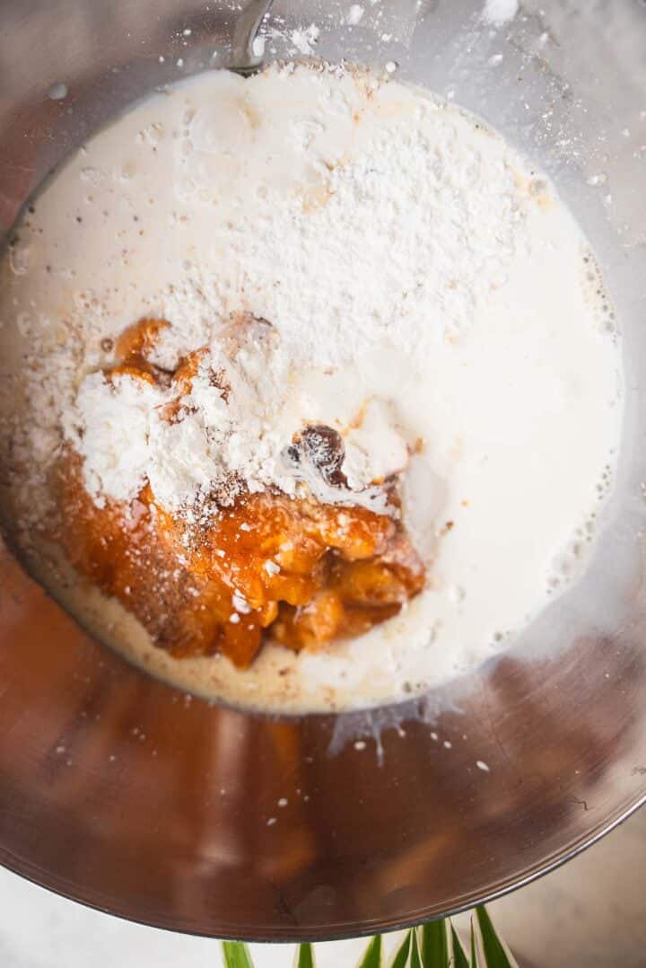 Pumpkin pie ingredients in a mixing bowl