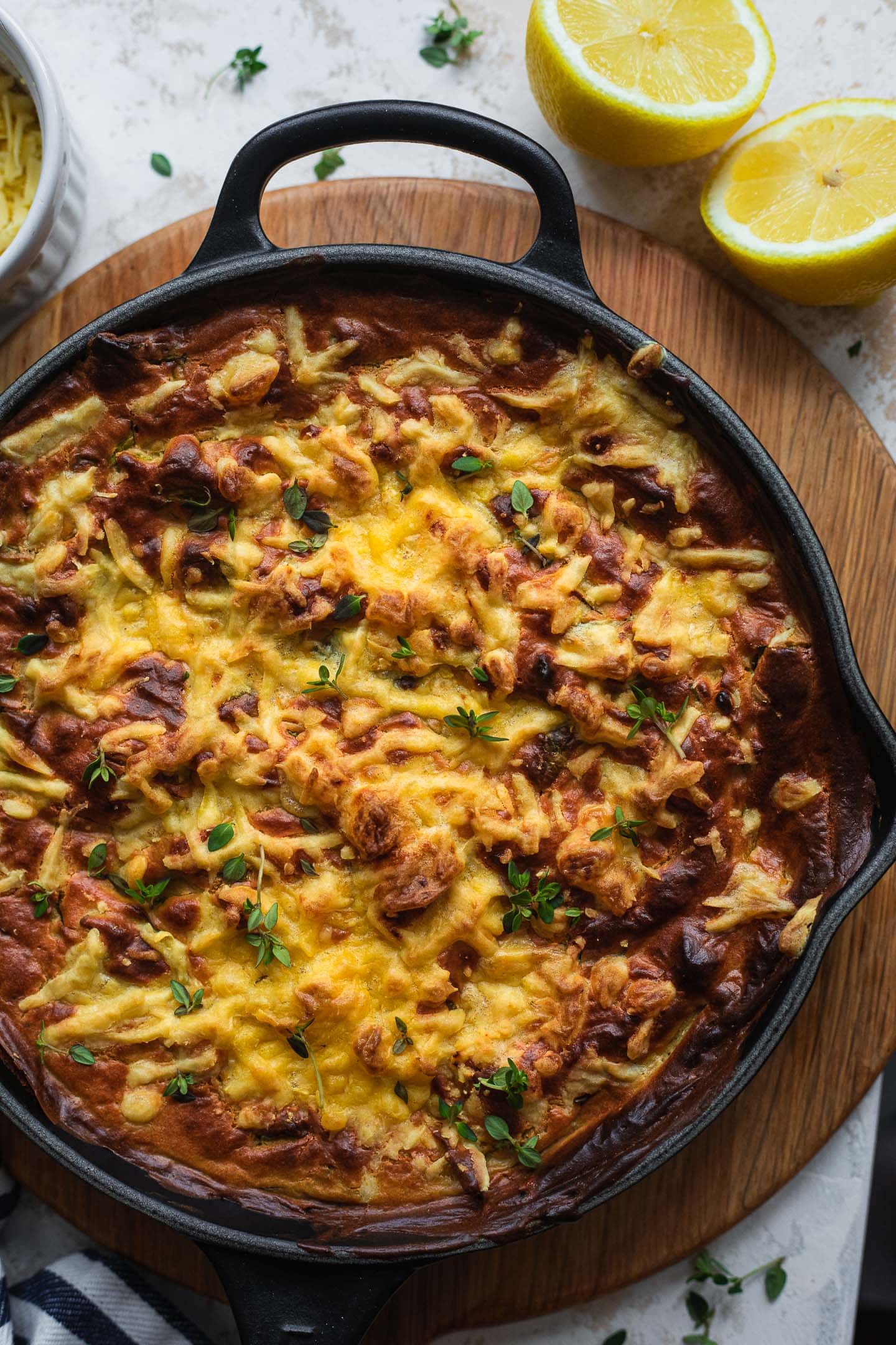 Vegan spinach artichoke dip in a cast iron skillet