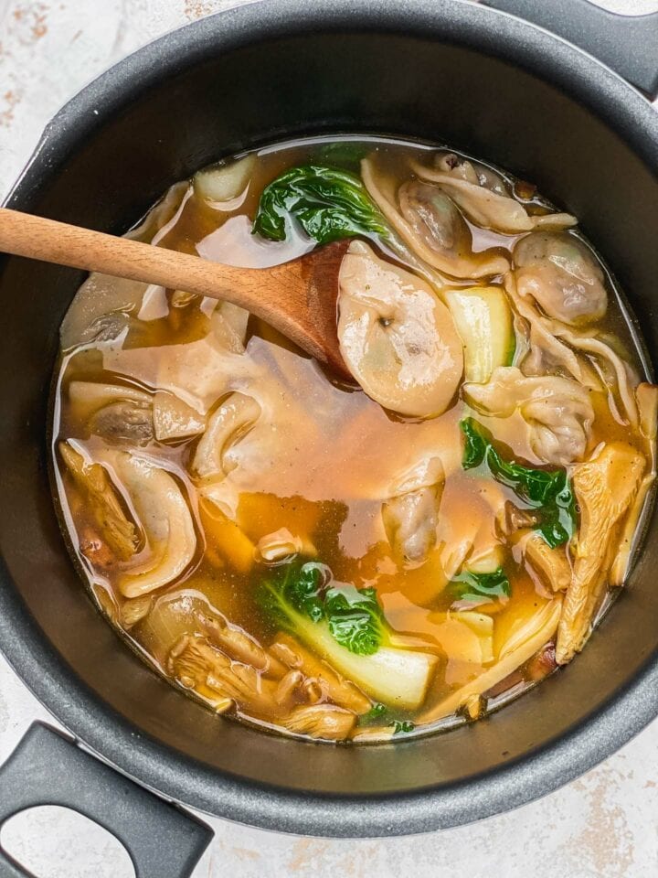 Vegetarian wonton soup in a saucepan