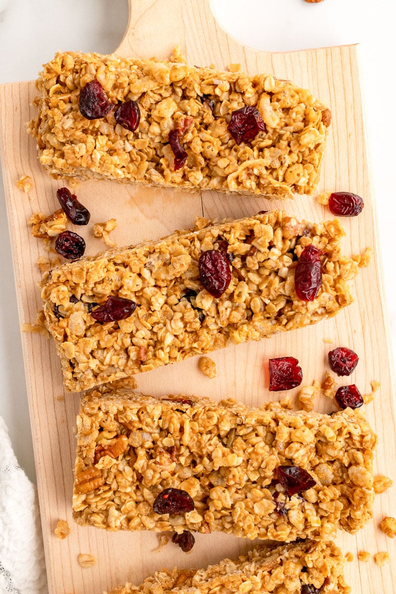 top view of vegan granola bars on wooden cutting board