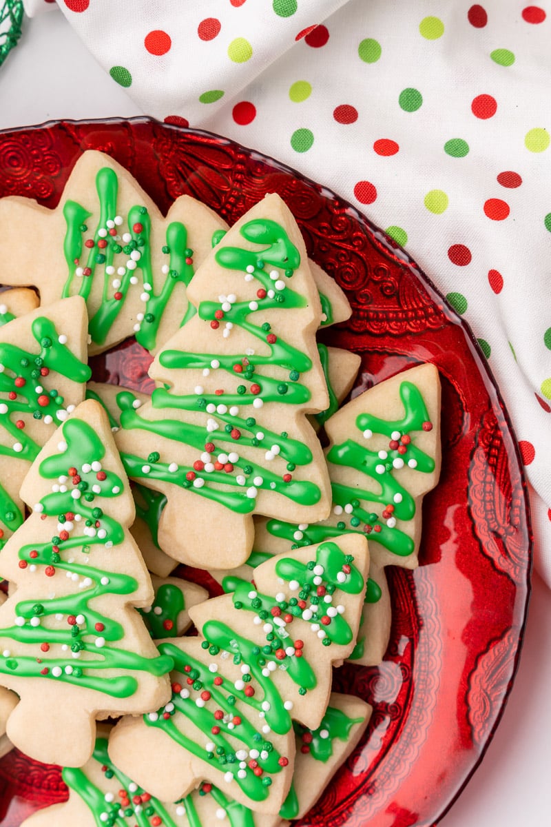 closeup of vegan christmas cookies shaped like christmas trees