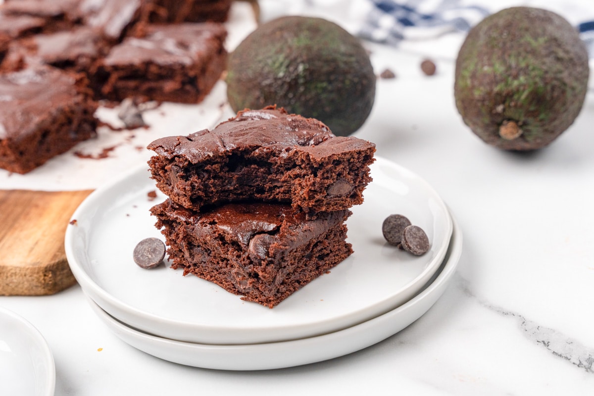 avocado brownies being served on a white plate