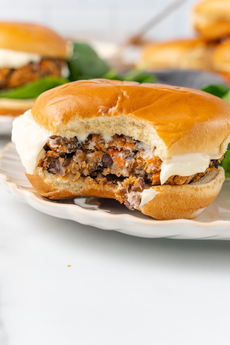 vegan black bean burger with a bite taken out of it