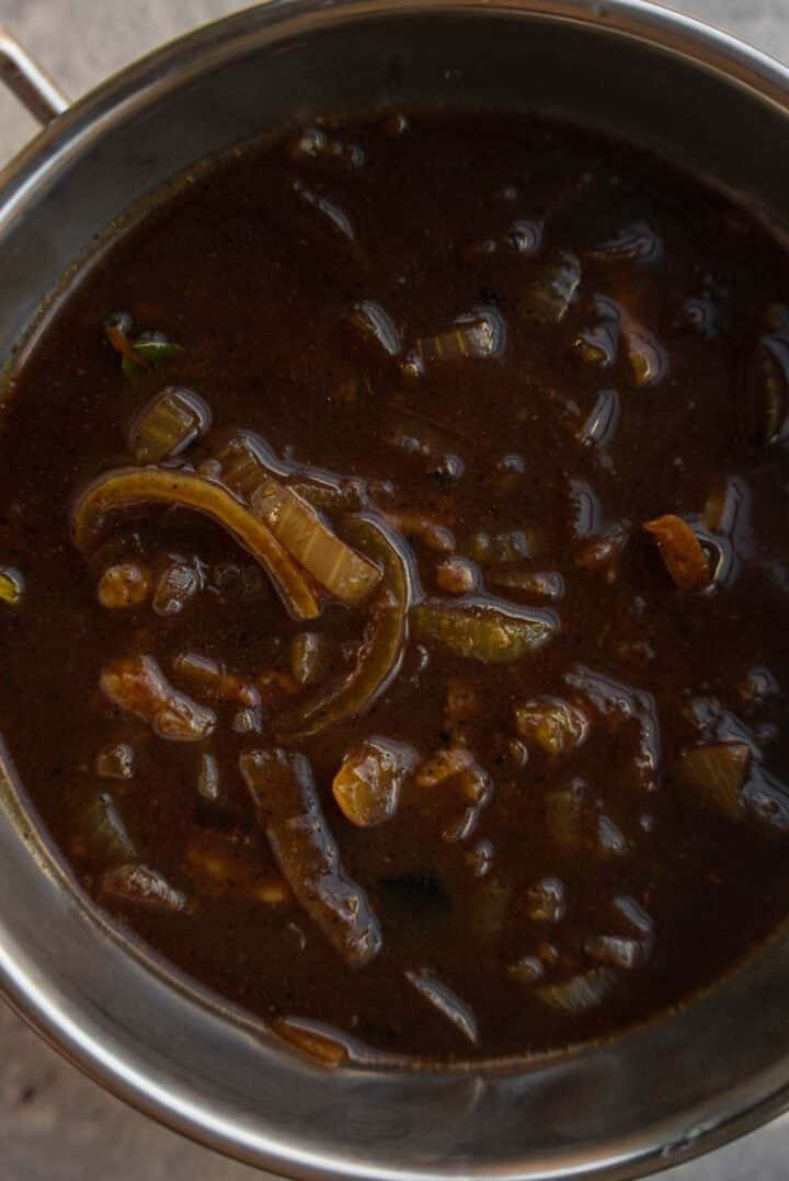 Caramelized onion soup in a saucepan