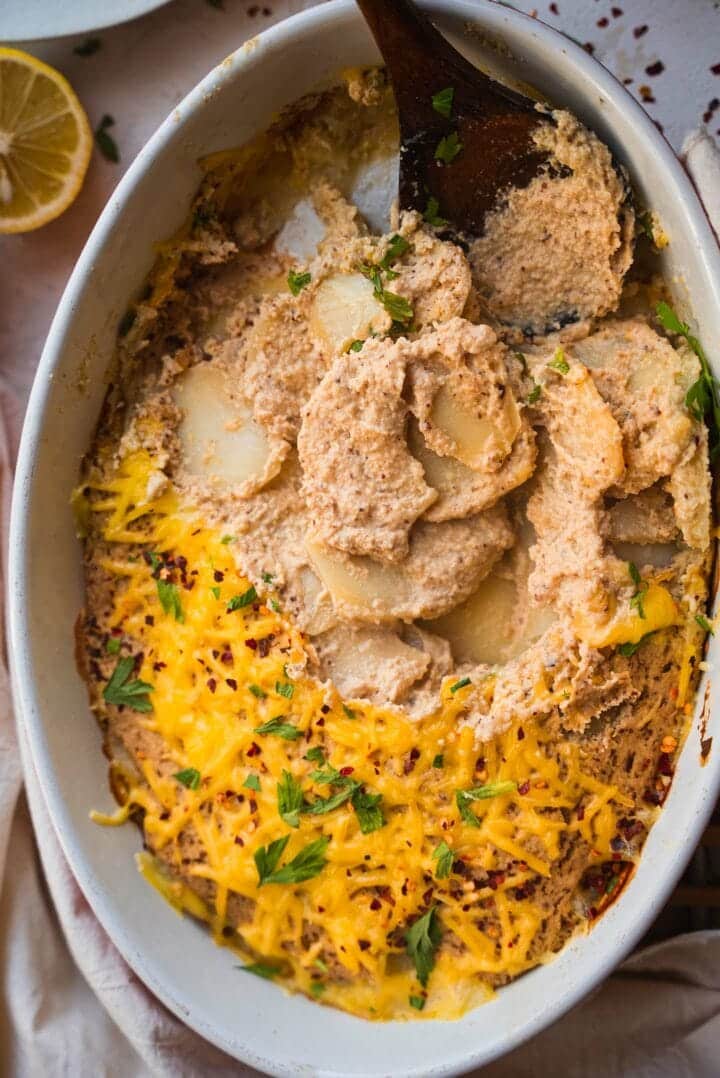 Cheesy vegan potatoes in a baking dish