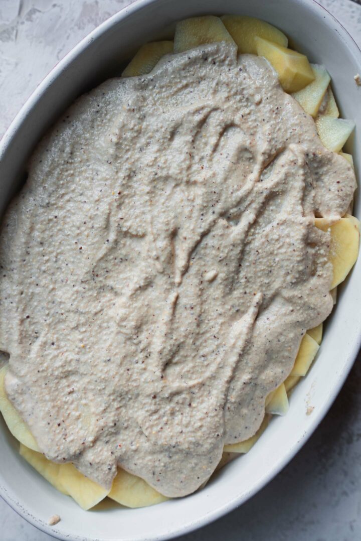 Potatoes in a cheesy sauce in a baking dish