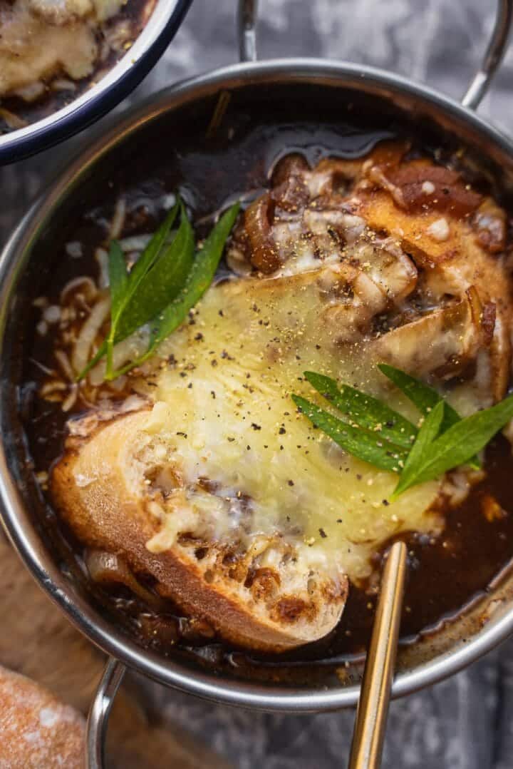 Vegan soup with baguette and cheese