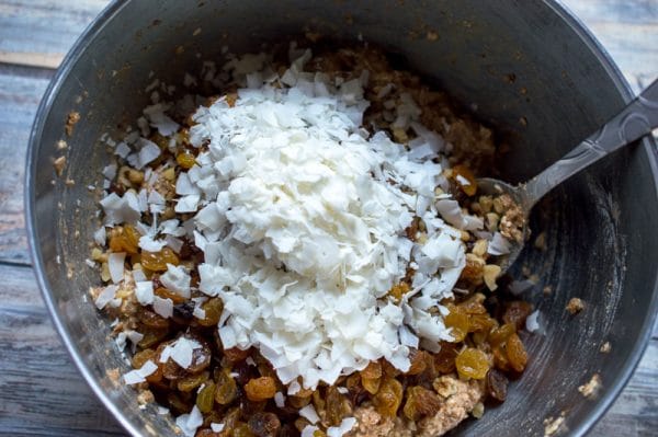 folding coconut into carrot muffin batter