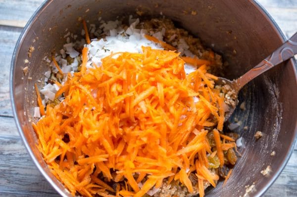 adding carrots to the vegan carrot muffin batter