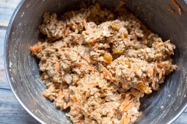 mixing the batter for healthy carrot muffins