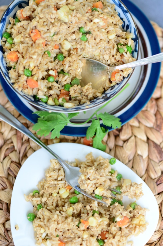 vegan fried rice being served from a bowl
