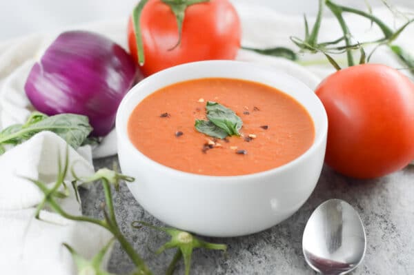 vegan tomato soup being served
