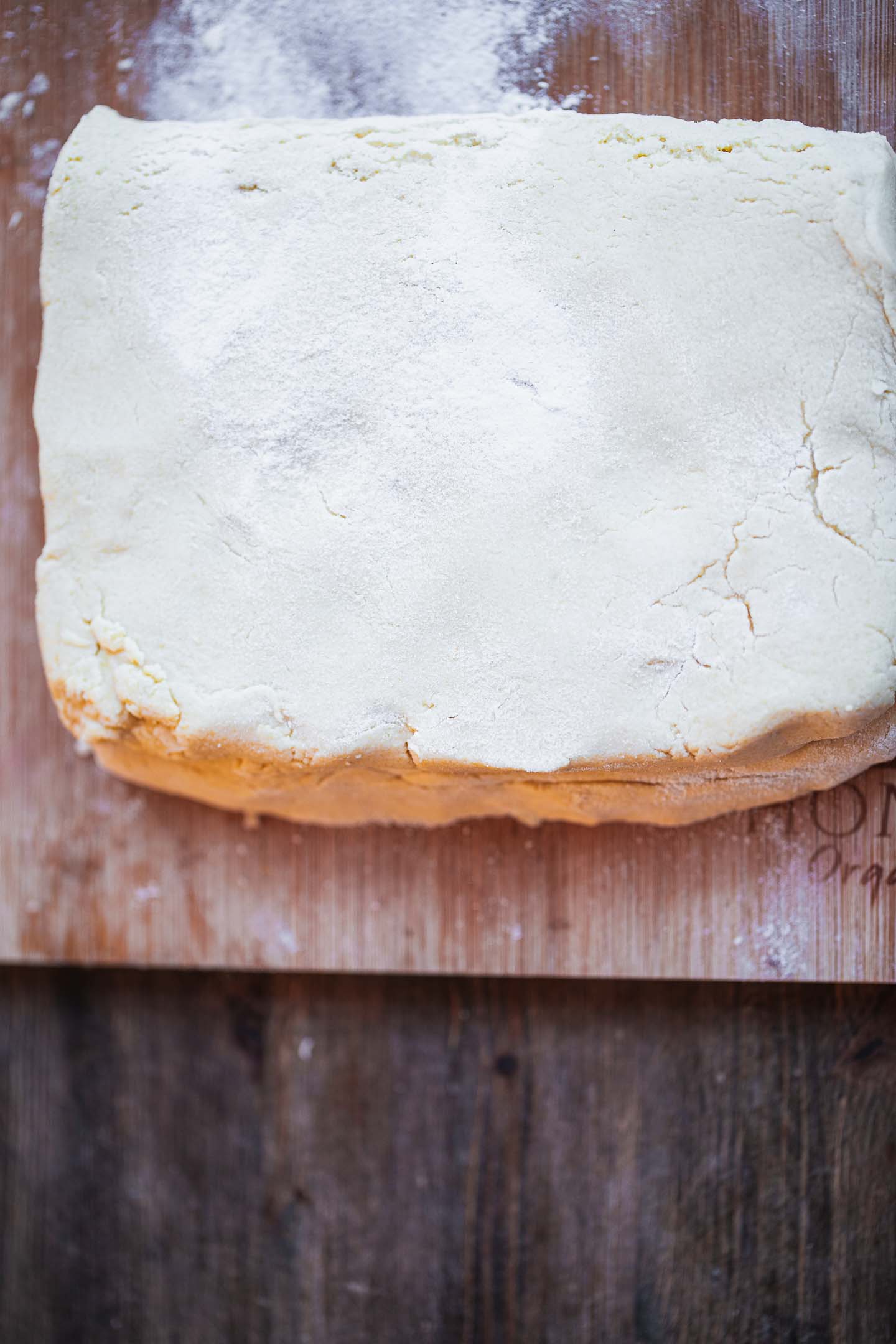 Dough for vegan biscuits on a wooden board