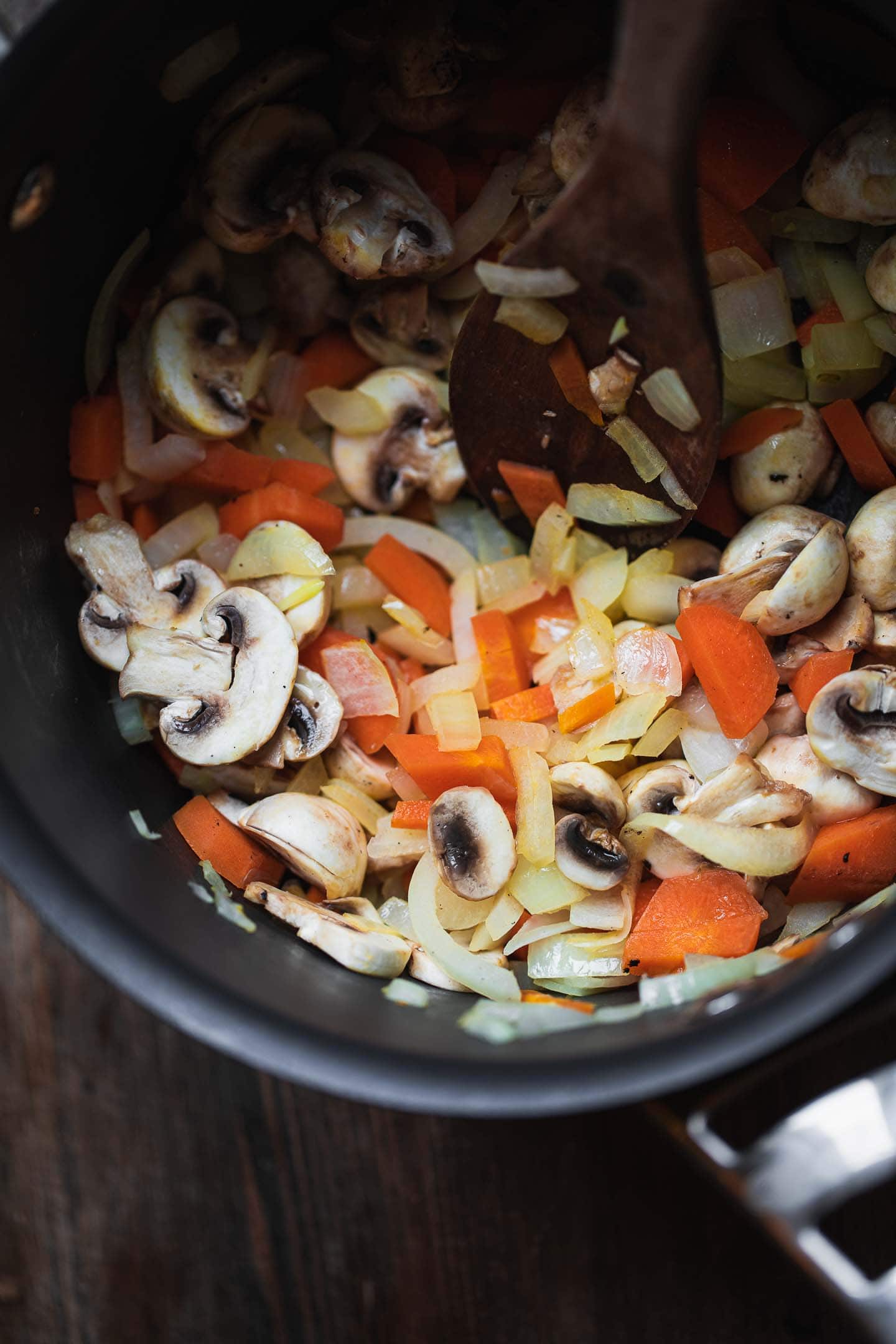 Vegetables for vegan gravy in a saucepan