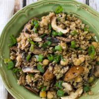 Cauliflower fried rice with mushrooms and chickpeas in a skillet