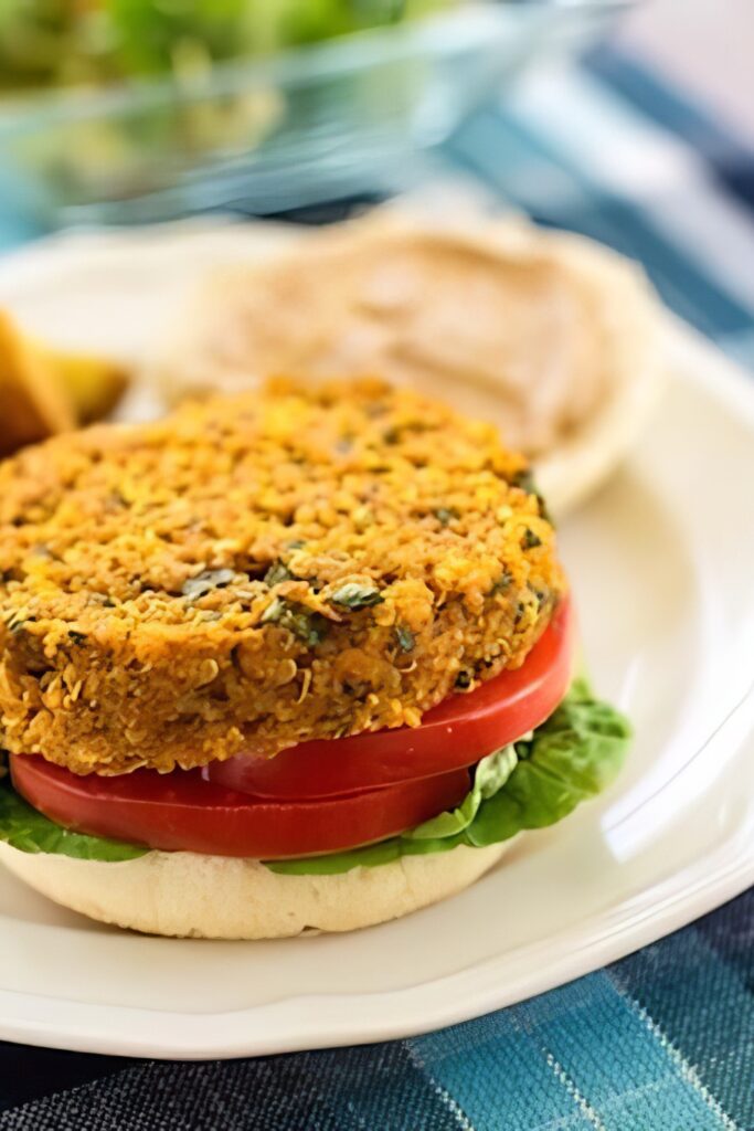 Quinoa and red lentil burger stacked vertically