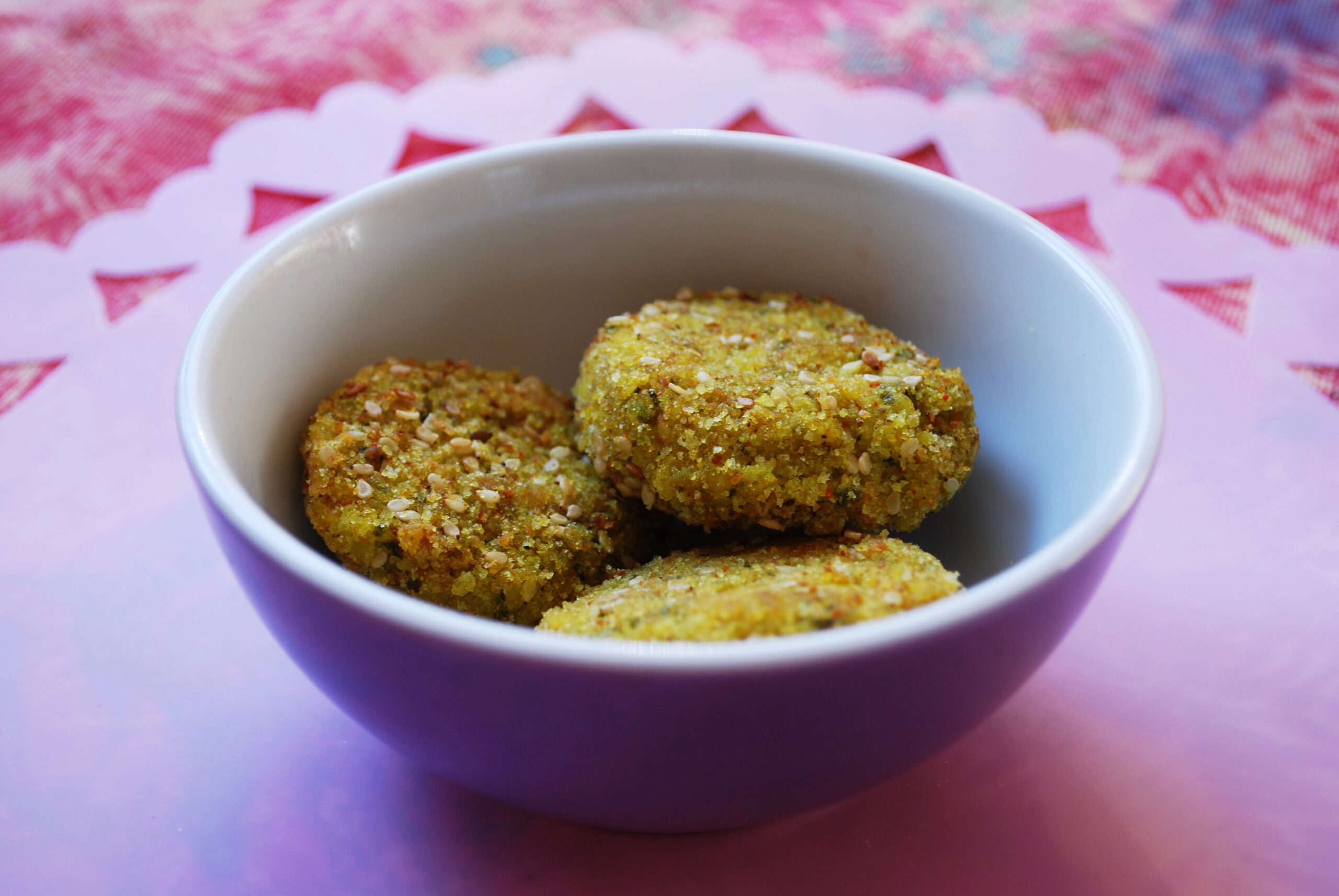 Vegan curried tofu burgers on a plate