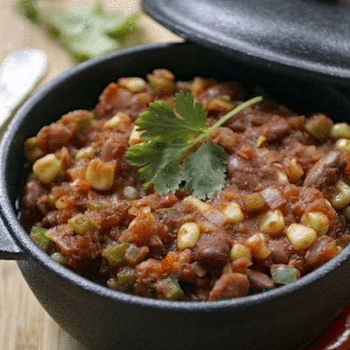 Classic Vegan Chili featured image graphic with a bowl of chili in a black pot