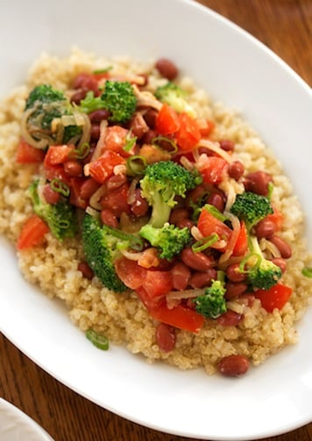 Close-up of miso-ginger red beans with quinoa and broccoli