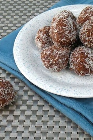 No-bake vegan cocoa maca-roons vertical photo