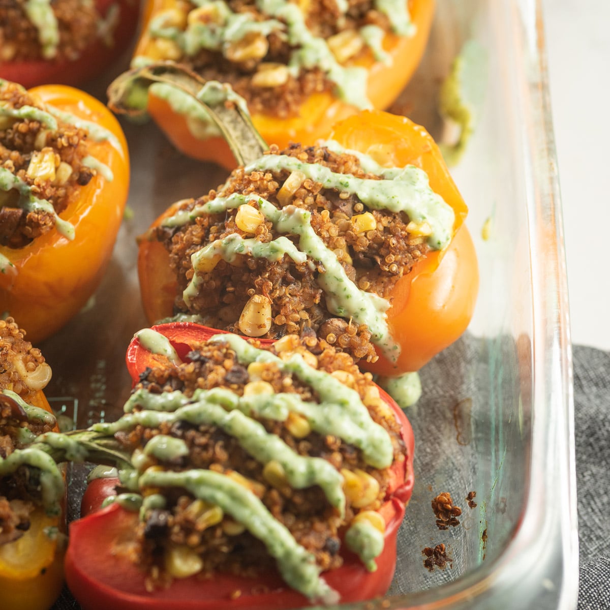 Veggie Quinoa Stuffed Peppers - photo courtesy of Oh My Veggies