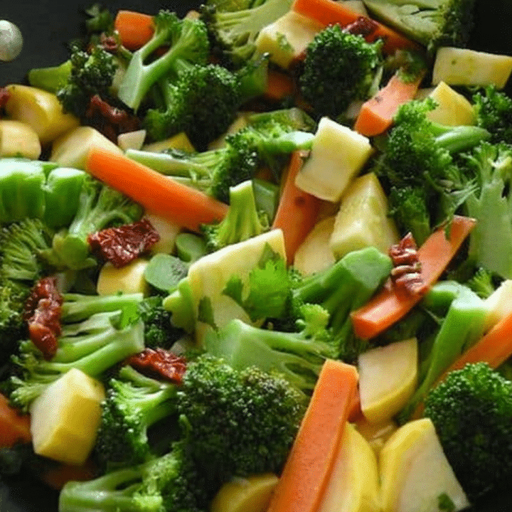 Sautéed broccoli rabe with baby carrots and yellow squash