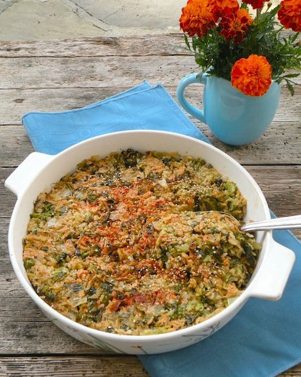 Close-up of vegan cheddar and broccoli rice casserole being served