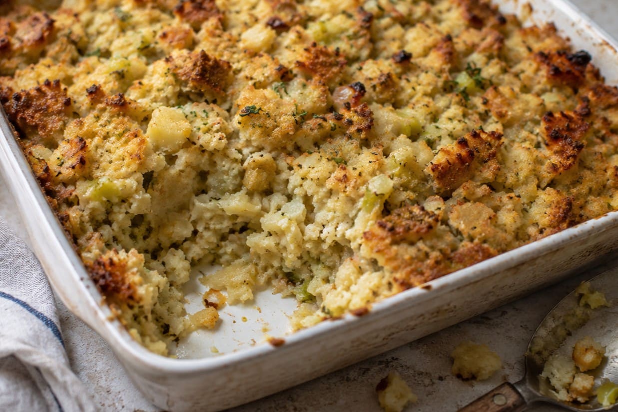 Baked potato bread stuffing in a casserole dish