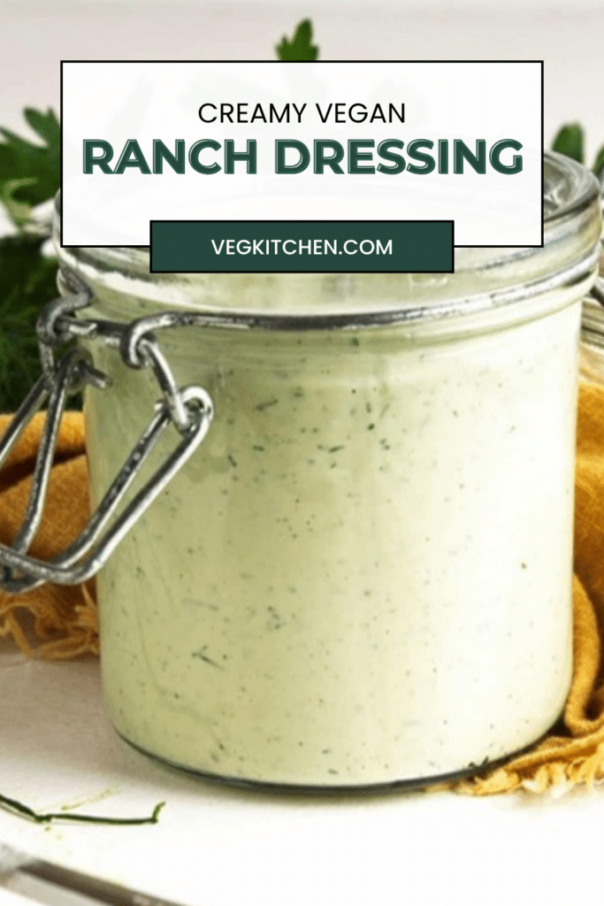 Pinterest pin for creamy vegan ranch dressing with jar of dressing and fresh herbs
