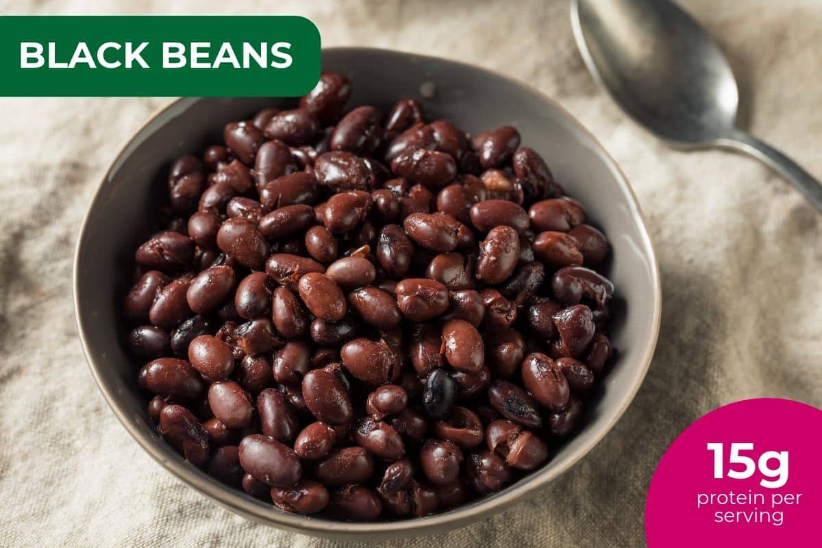 Bowl of cooked black beans, labeled 15 g protein per serving