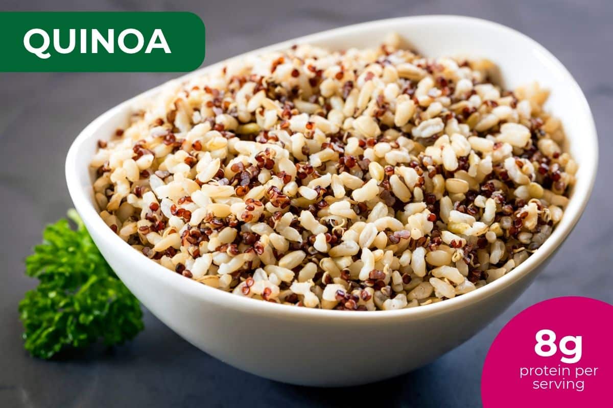 White bowl of cooked tri-color quinoa, labeled 8 g protein per serving