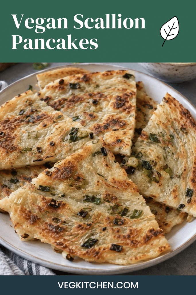 Vegan scallion pancakes Pinterest pin with layered pancake wedges on a plate