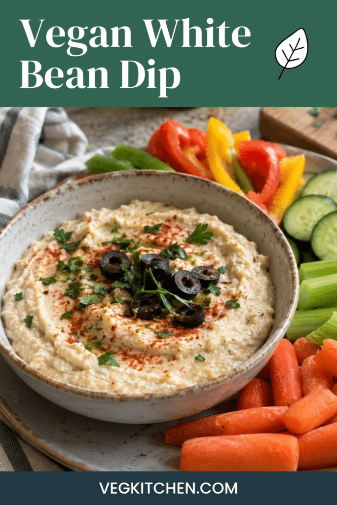 Vegan White Bean Dip - creamy white bean dip garnished with paprika, herbs and olives (Pinterest pin)